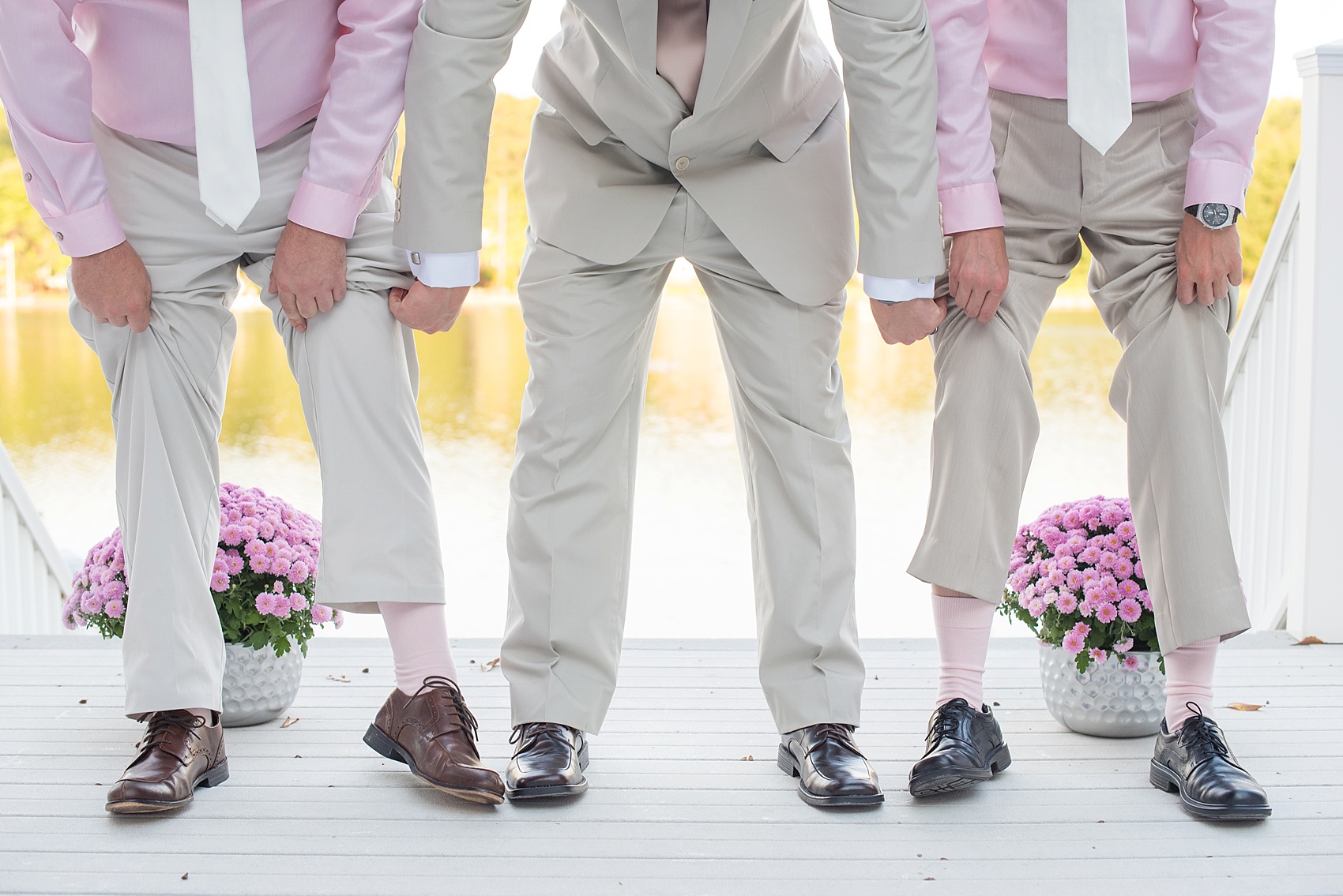 Raleigh wedding photos by Mikkel Paige Photography. Groomsmen and the groom get ready with pink details! 