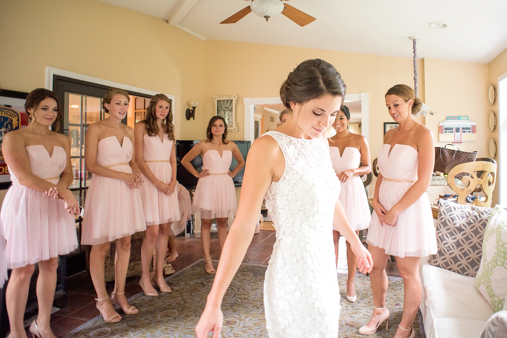 Getting ready wedding photos with pink bridesmaids. By NYC wedding photographer Mikkel Paige Photography.