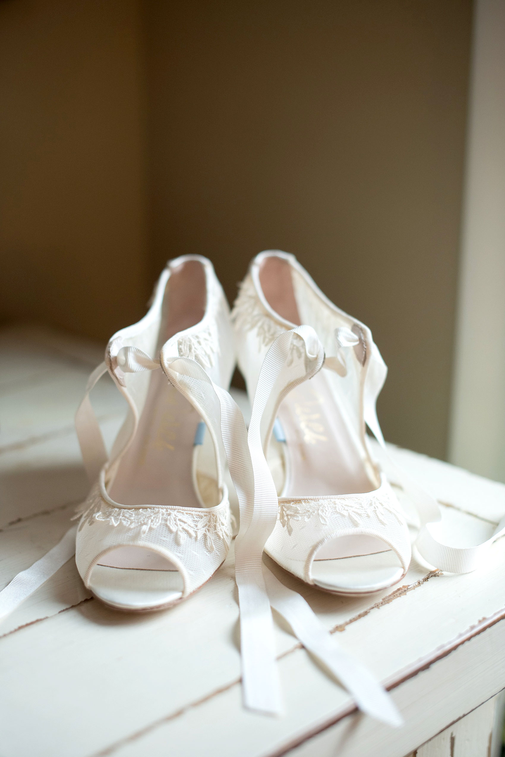 Bride's mesh and lace up wedding day shoes. Images by NYC wedding photographer Mikkel Paige Photography.
