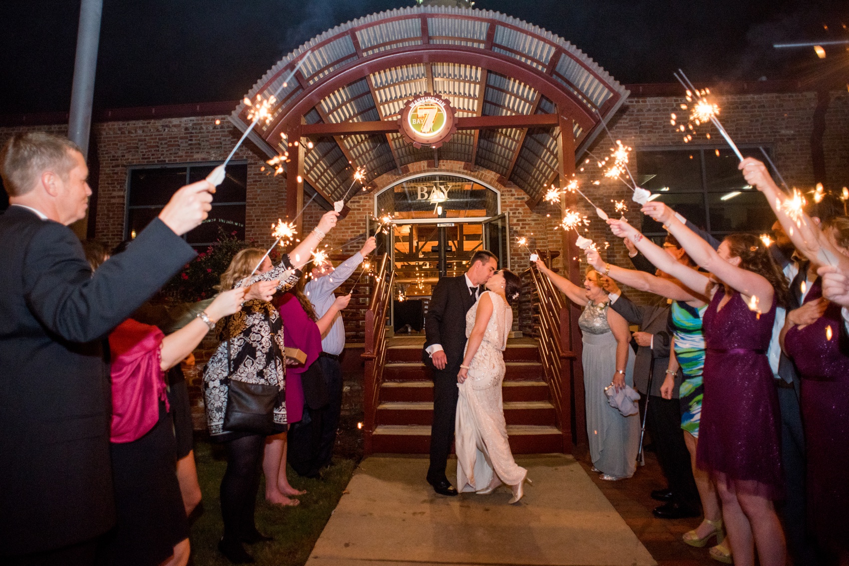 Bay 7 wedding photos by Mikkel Paige Photography. Raleigh wedding photographer captures a black and crystal indoor romantic art deco reception and sparkler exit.
