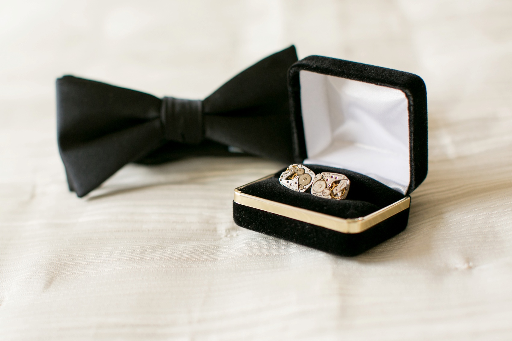 Watch gear cufflinks for a NY wedding, photos by Mikkel Paige Photography, NYC wedding photographer. Planning by Dulce Dreams Events, flowers by Sachi Rose.