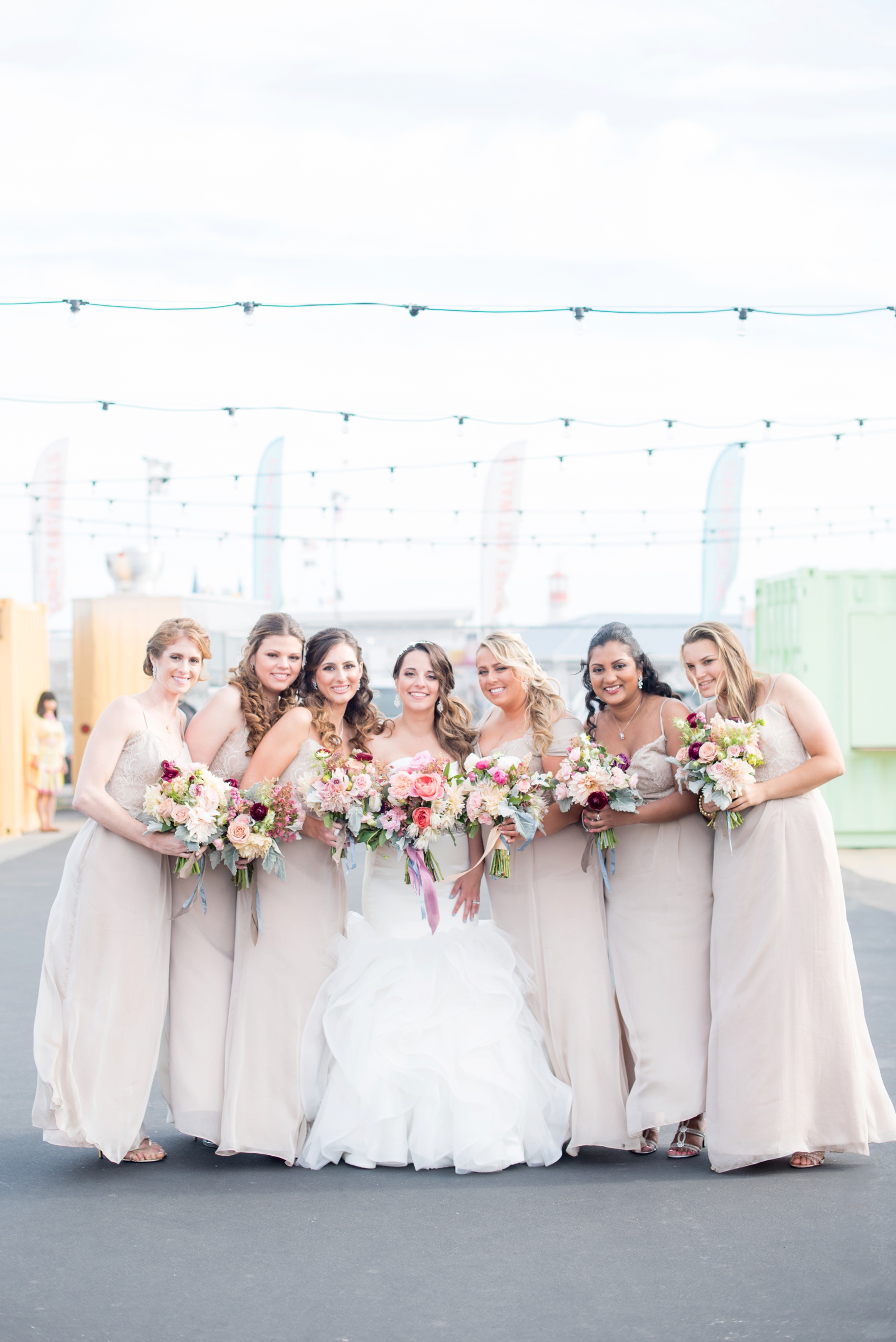 Coney Island colorful mural graffiti wedding bridal party photos by Mikkel Paige Photography, NYC wedding photographer. Planning by Dulce Dreams Events, flowers by Sachi Rose.