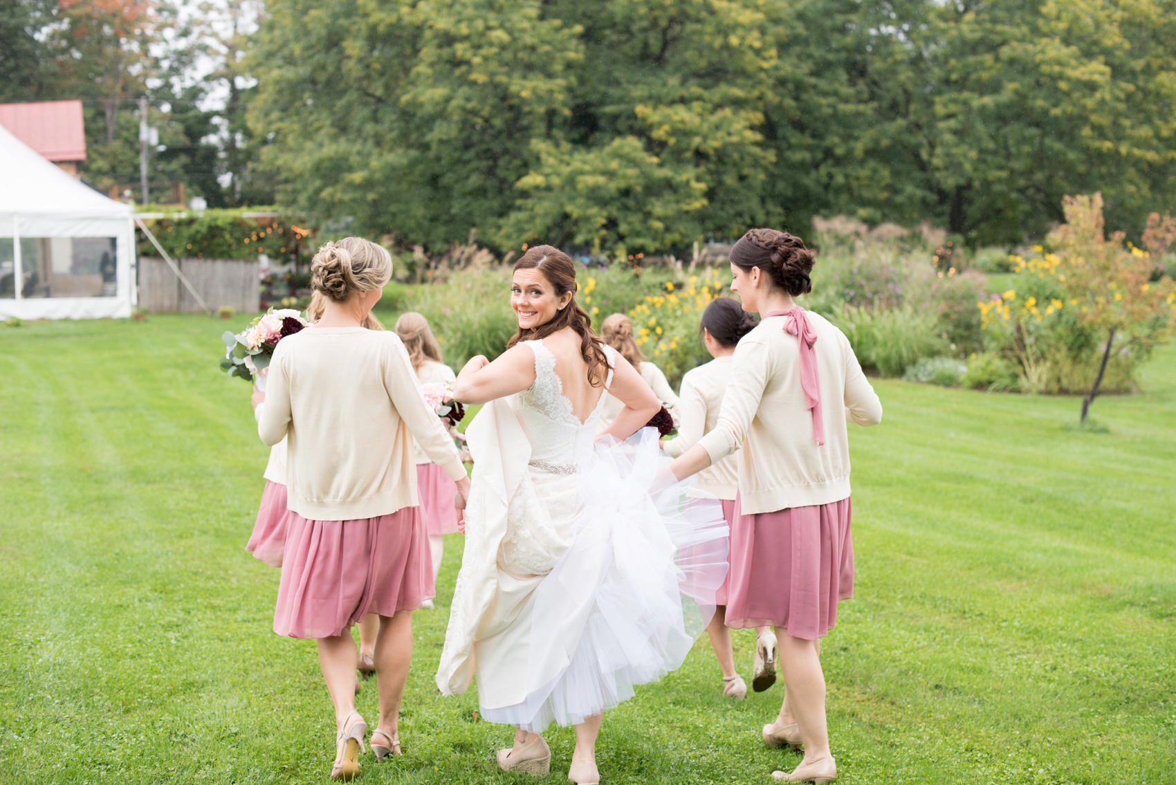 A Red Maple Vineyard wedding with dusty rose short dress bridesmaids. Photo by NYC wedding photographer Mikkel Paige Photography.