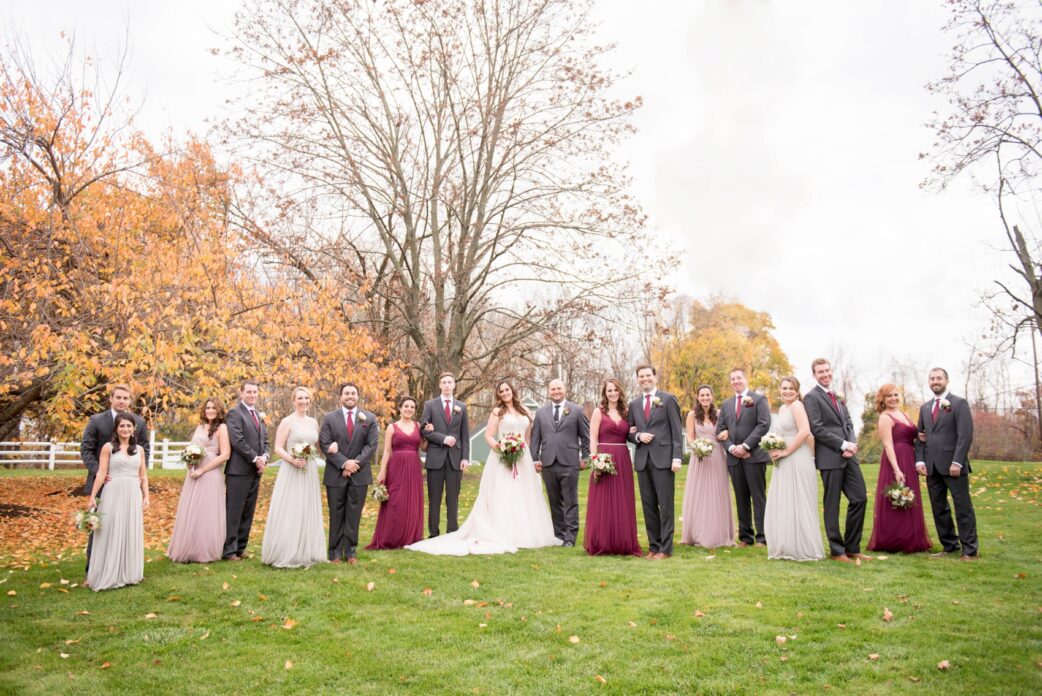 Olde Mill Inn New Jersey wedding by Mikkel Paige Photography, NYC and Raleigh wedding photographer. Bridal wedding party fall photos with burgundy, grey and dusty rose gowns.