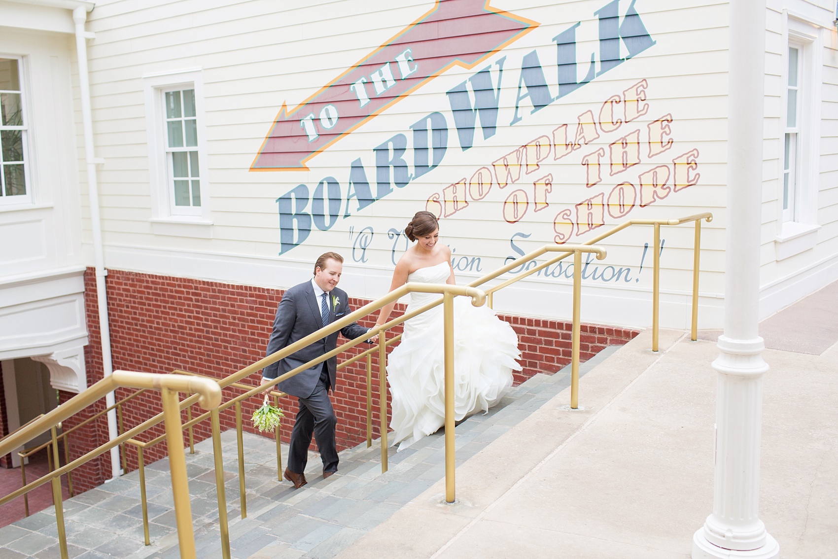 Walt Disney World wedding pictures at the Boardwalk venue, including a waterfront ceremony and Dance Hall reception near Epcot. These photos will give you unique, fun ideas from Glow in the Dark invitations to their Dole Whip flavored cake! Want to see more? Click through to Mikkel Paige Photography for more inspiration from this bride and groom's colorful day! #DisneyWedding #mikkelpaige #disneysboardwalk #DisneyWeddingVenue #DisneyBride #DisneyFan #MickeyEars