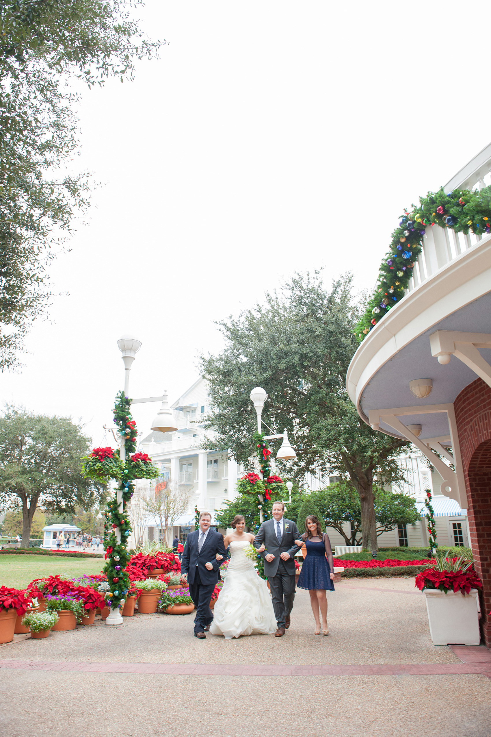 Walt Disney World wedding pictures at the Boardwalk venue, including a waterfront ceremony and Dance Hall reception near Epcot. These photos will give you unique, fun ideas from Glow in the Dark invitations to their Dole Whip flavored cake! Want to see more? Click through to Mikkel Paige Photography for more inspiration from this bride and groom's colorful day! #DisneyWedding #mikkelpaige #disneysboardwalk #DisneyWeddingVenue #DisneyBride #DisneyFan #MickeyEars