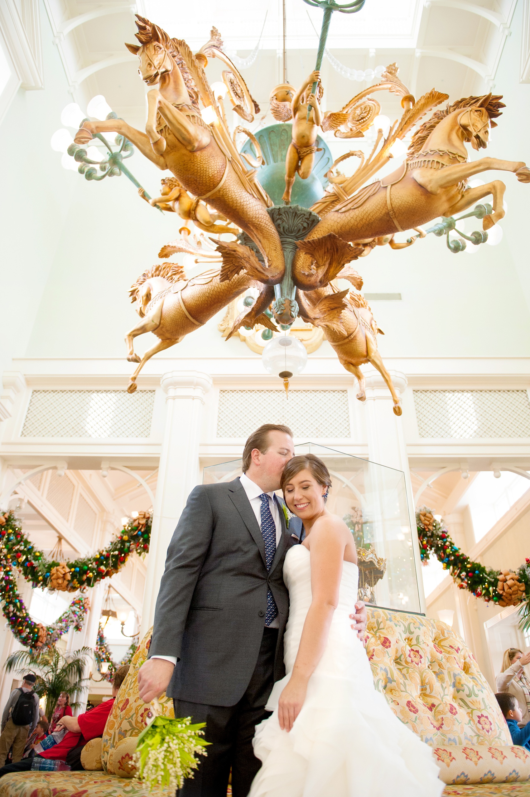 Walt Disney World wedding pictures at the Boardwalk venue, including a waterfront ceremony and Dance Hall reception near Epcot. These photos will give you unique, fun ideas from Glow in the Dark invitations to their Dole Whip flavored cake! Want to see more? Click through to Mikkel Paige Photography for more inspiration from this bride and groom's colorful day! #DisneyWedding #mikkelpaige #disneysboardwalk #DisneyWeddingVenue #DisneyBride #DisneyFan #MickeyEars