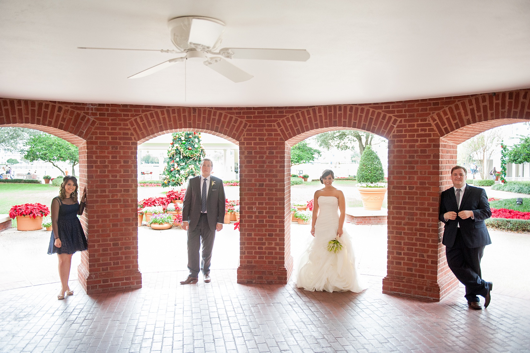 Walt Disney World wedding pictures at the Boardwalk venue, including a waterfront ceremony and Dance Hall reception near Epcot. These photos will give you unique, fun ideas from Glow in the Dark invitations to their Dole Whip flavored cake! Want to see more? Click through to Mikkel Paige Photography for more inspiration from this bride and groom's colorful day! #DisneyWedding #mikkelpaige #disneysboardwalk #DisneyWeddingVenue #DisneyBride #DisneyFan #MickeyEars