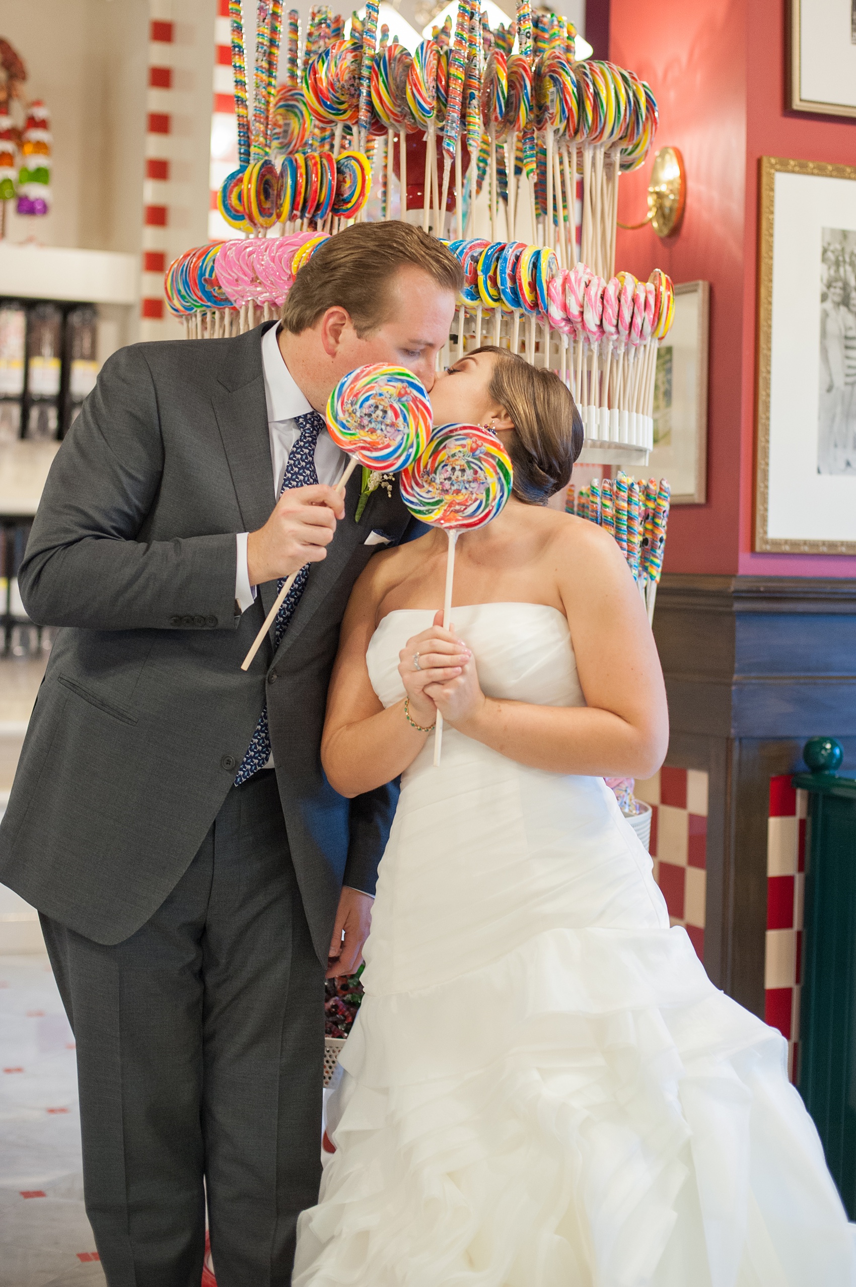 Walt Disney World wedding pictures at the Boardwalk venue, including a waterfront ceremony and Dance Hall reception near Epcot. These photos will give you unique, fun ideas from Glow in the Dark invitations to their Dole Whip flavored cake! Want to see more? Click through to Mikkel Paige Photography for more inspiration from this bride and groom's colorful day! #DisneyWedding #mikkelpaige #disneysboardwalk #DisneyWeddingVenue #DisneyBride #DisneyFan #MickeyEars