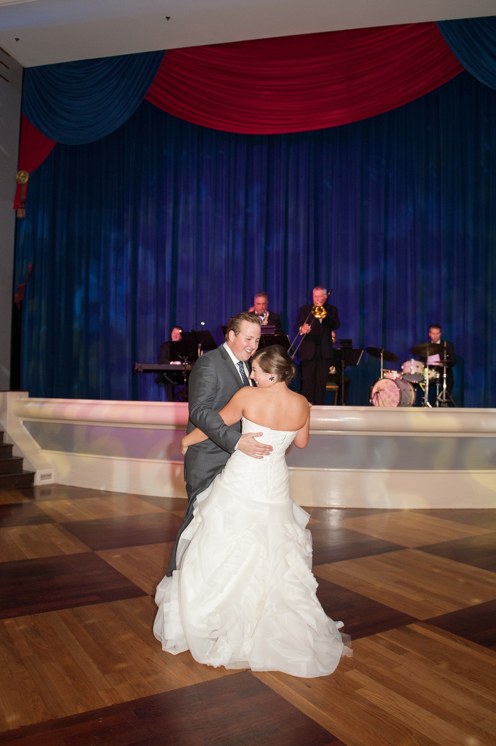 Walt Disney World wedding pictures at the Boardwalk venue, including a waterfront ceremony and Dance Hall reception near Epcot. These photos will give you unique, fun ideas from Glow in the Dark invitations to their Dole Whip flavored cake! Want to see more? Click through to Mikkel Paige Photography for more inspiration from this bride and groom's colorful day! #DisneyWedding #mikkelpaige #disneysboardwalk #DisneyWeddingVenue #DisneyBride #DisneyFan #MickeyEars