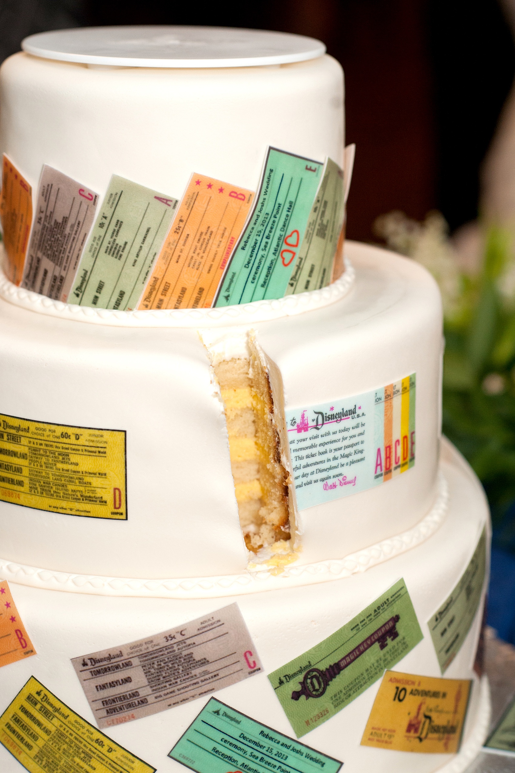 Walt Disney World wedding pictures at the Boardwalk venue, including a waterfront ceremony and Dance Hall reception near Epcot. These photos will give you unique, fun ideas from Glow in the Dark invitations to their Dole Whip flavored cake with a custom cake topper and "E Ticket" details. Want to see more? Click through to Mikkel Paige Photography for more inspiration from this bride and groom's colorful day! #DisneyWedding #mikkelpaige #disneysboardwalk #DisneyWeddingVenue #DisneyBride #DisneyFan #MickeyEars