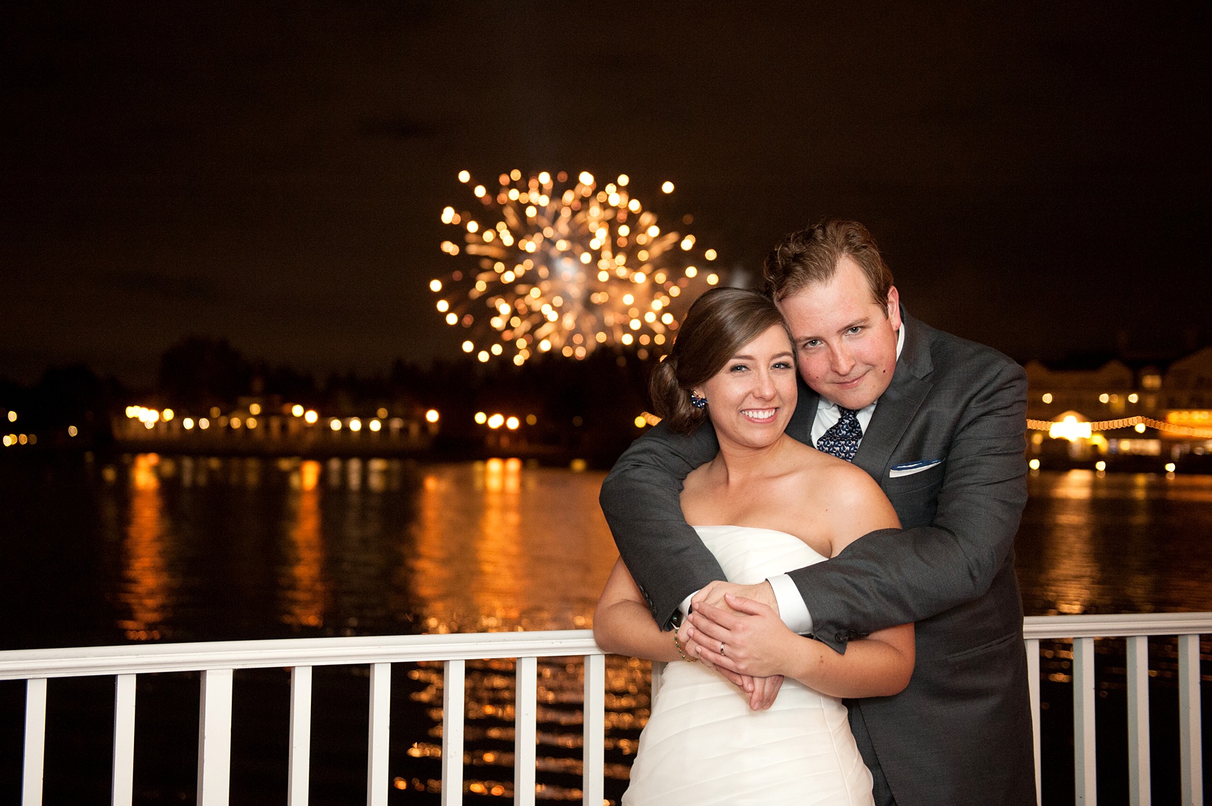 Walt Disney World wedding pictures at the Boardwalk venue, including a waterfront ceremony and Dance Hall reception near Epcot. These photos will give you unique, fun ideas from Glow in the Dark invitations to their Dole Whip flavored cake! Want to see more? Click through to Mikkel Paige Photography for more inspiration from this bride and groom's colorful day! #DisneyWedding #mikkelpaige #disneysboardwalk #DisneyWeddingVenue #DisneyBride #DisneyFan #MickeyEars #Fireworks