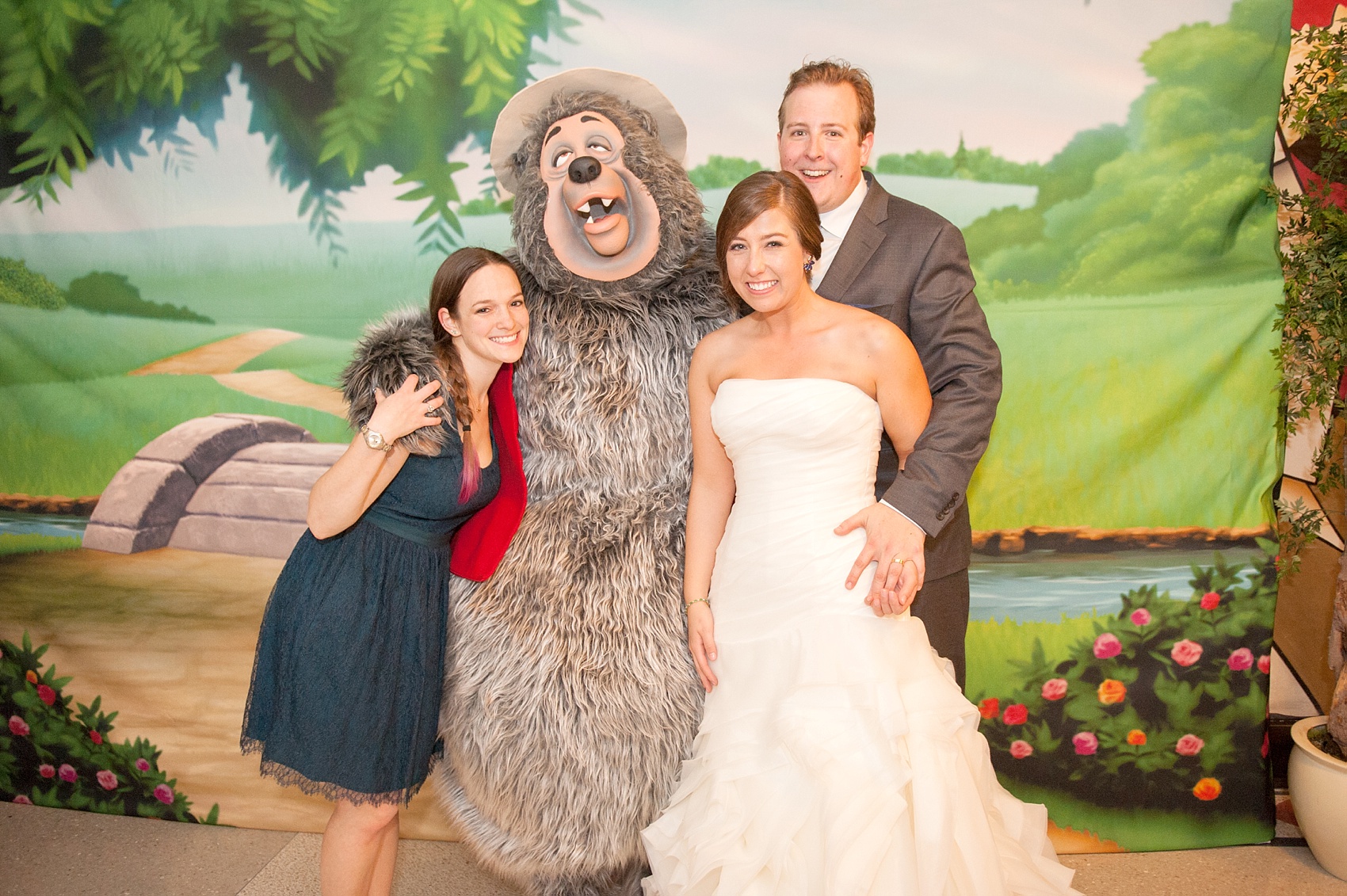 Walt Disney World wedding pictures at the Boardwalk venue, including a waterfront ceremony and Dance Hall reception near Epcot. These photos will give you unique, fun ideas from Glow in the Dark invitations to their Dole Whip flavored cake! Want to see more? Click through to Mikkel Paige Photography for more inspiration from this bride and groom's colorful day! #DisneyWedding #mikkelpaige #disneysboardwalk #DisneyWeddingVenue #DisneyBride #DisneyFan #MickeyEars #CountryBearJamboree