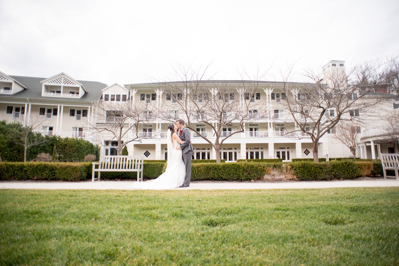 Omni Bedford Springs Resort wedding photos by Mikkel Paige Photography. Christmas holiday winter wonderland day with red and white color palette.