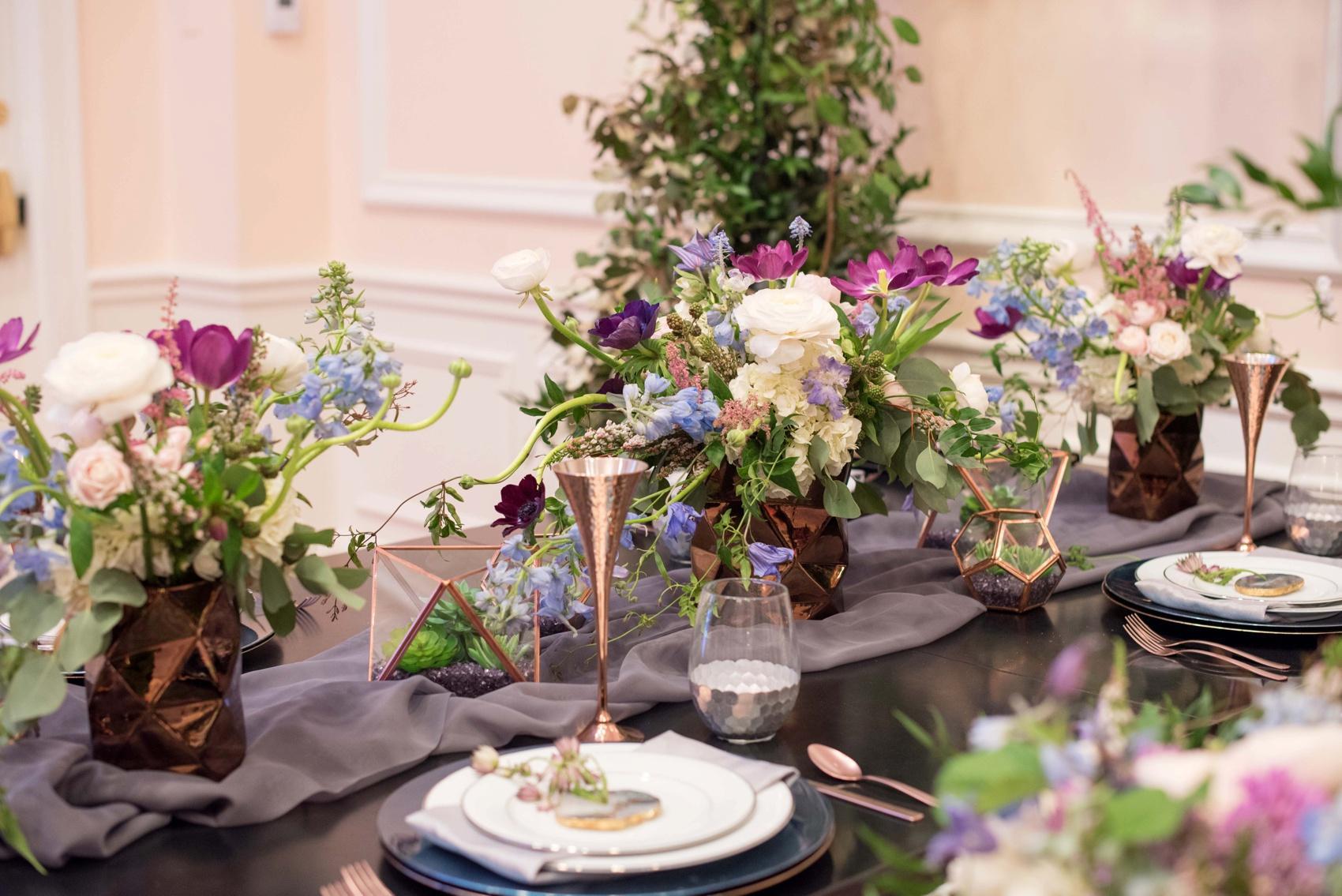 The Carolina Inn wedding photos - bridal showcase 2016. Mikkel Paige Photography captures the event with Eclectic Sage blue and purple flowers.