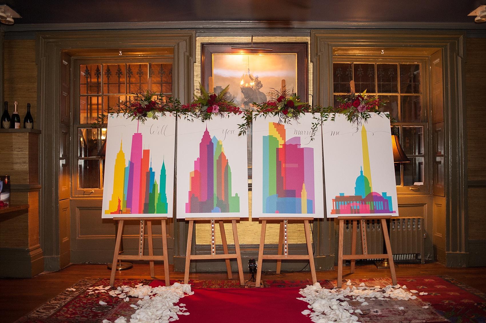 NYC proposal ideas with custom city paintings. Photos by Mikkel Paige Photography. Planning by Brilliant Event Planning and flowers by The Arrangement.