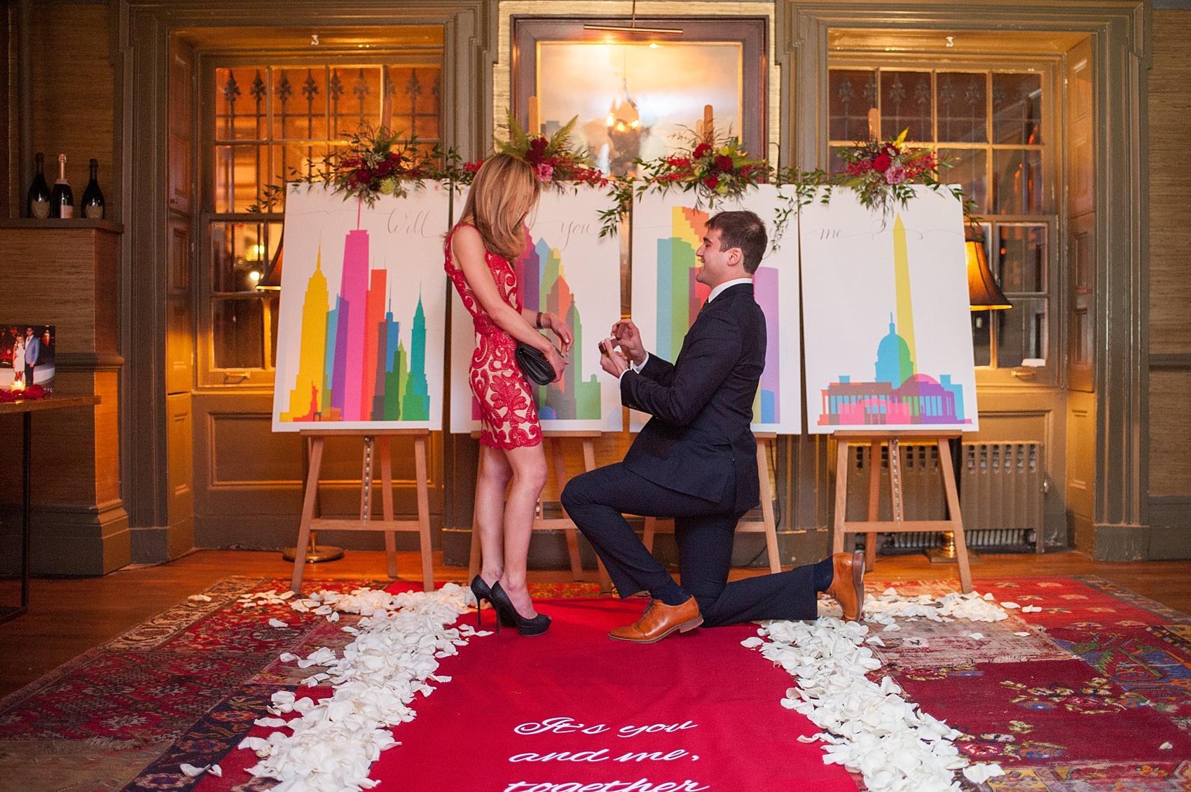 NYC proposal ideas with custom city paintings. Photos by Mikkel Paige Photography. Planning by Brilliant Event Planning and flowers by The Arrangement.