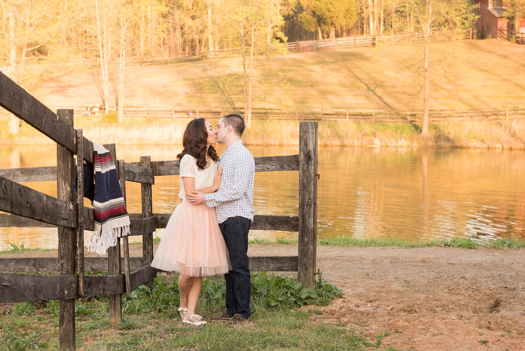 Raleigh farm engagement photos during spring by the lake. Images by Mikkel Paige Photography.