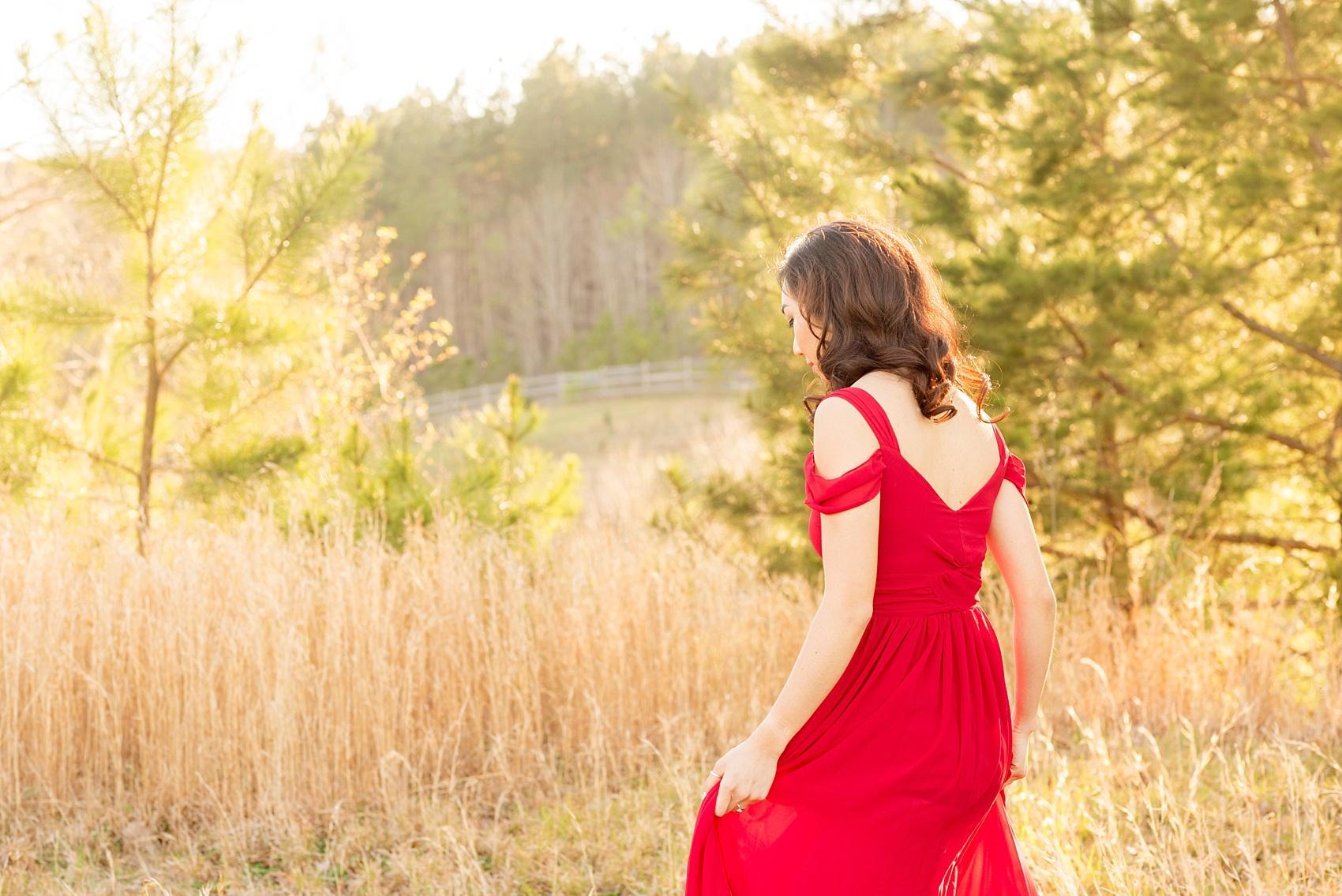 Raleigh engagement photos at Ovation Farm in Sanford by Mikkel Paige Photography. The bride wore a red gown.