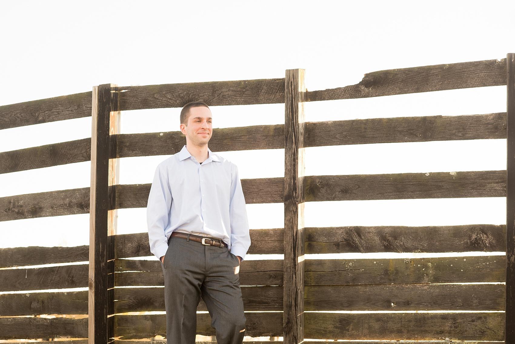 Raleigh engagement photos at Ovation Farm in Sanford by Mikkel Paige Photography. The groom wore formal slacks and a blue button down shirt.