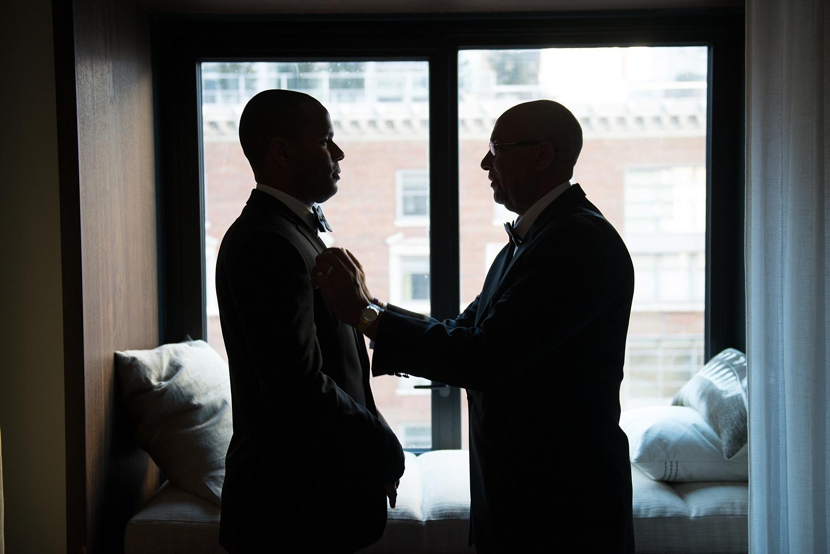 Groom getting ready photo by Mikkel Paige Photography. Image at 1 Hotel Central Park, NYC. 