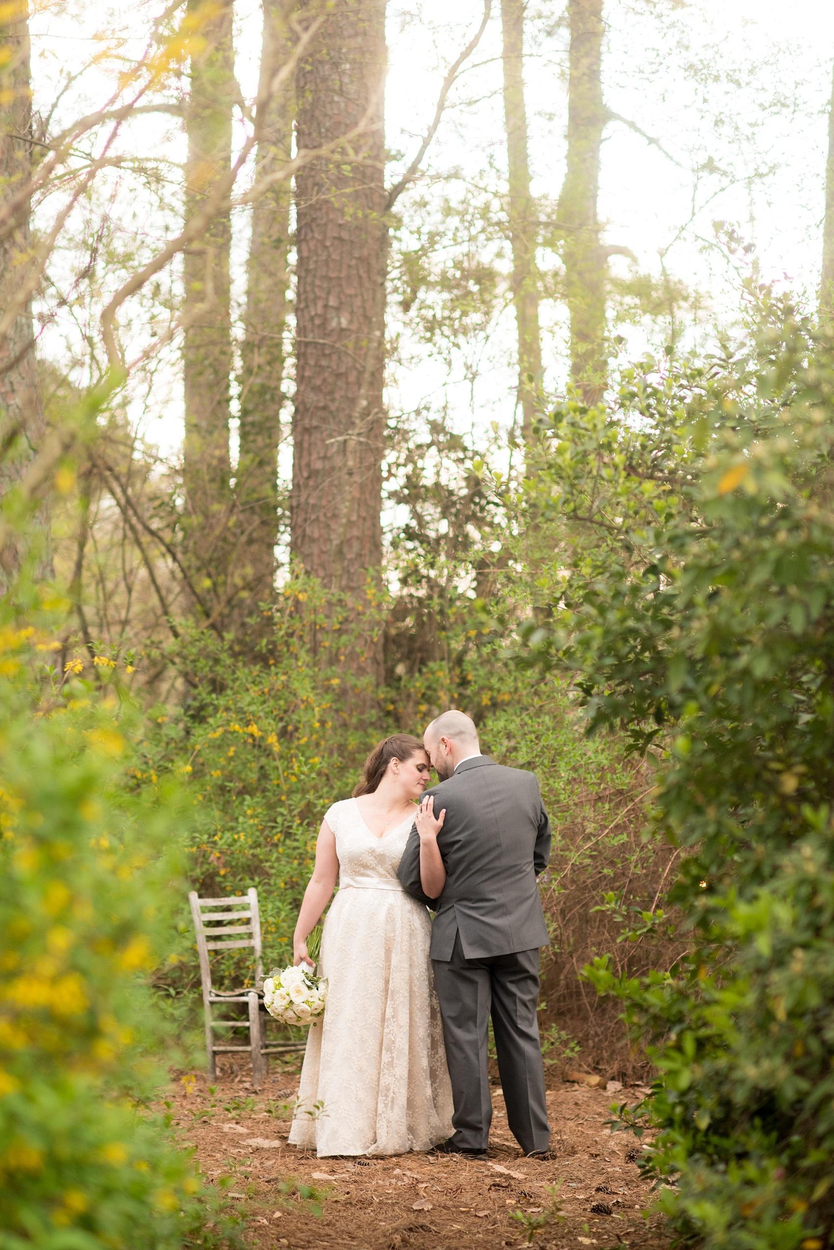 Golden hour bride and groom portrait in yellow spring flowers at a Four Oaks Manor wedding in Atlanta. Photos by Mikkel Paige Photography.