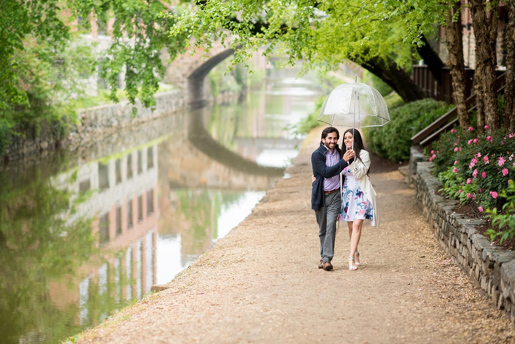 Photo by Mikkel Paige Photography for a rainy day Georgetown engagement session in Washington, DC on the C&O Canal.