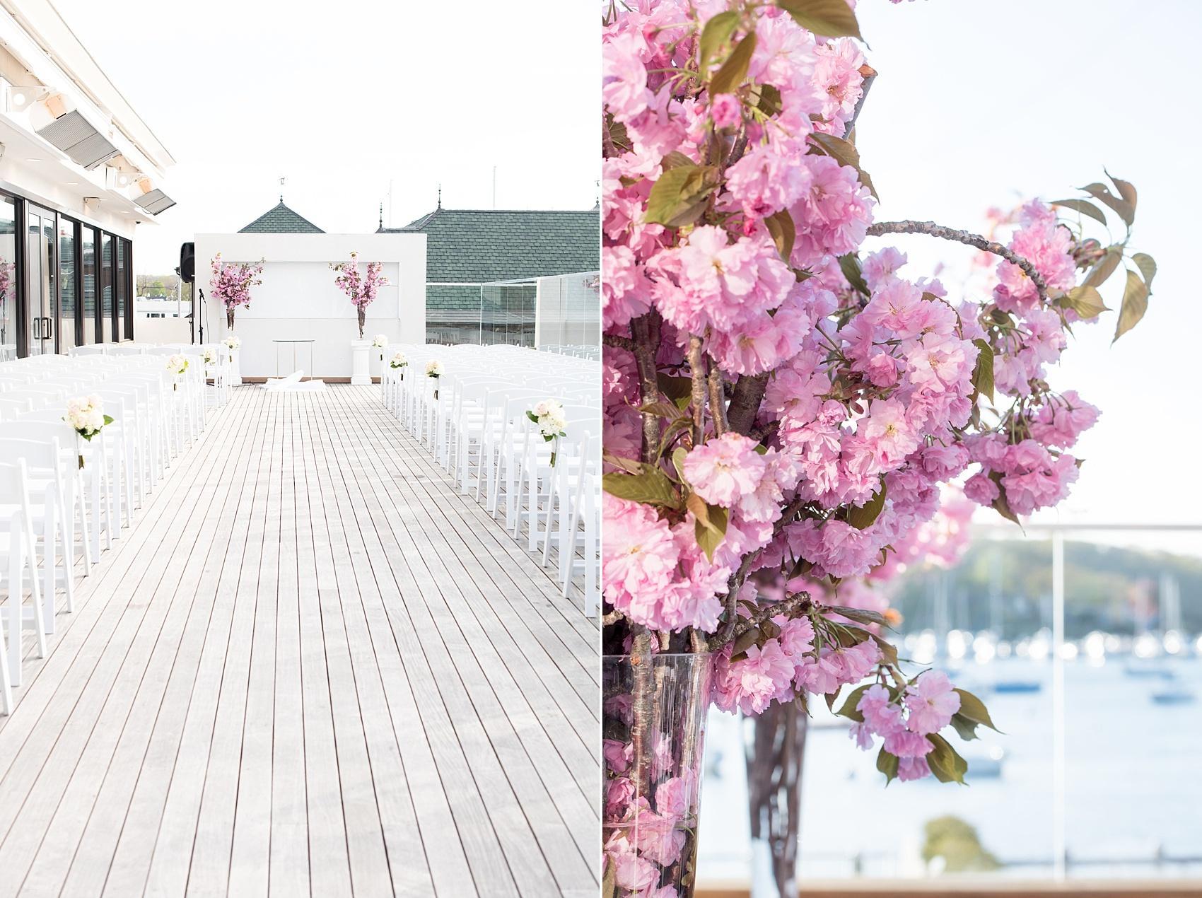 Photos by Mikkel Paige Photography for a wedding at Harbor Club on Long Island. Waterfront outdoor ceremony with cherry blossom details.