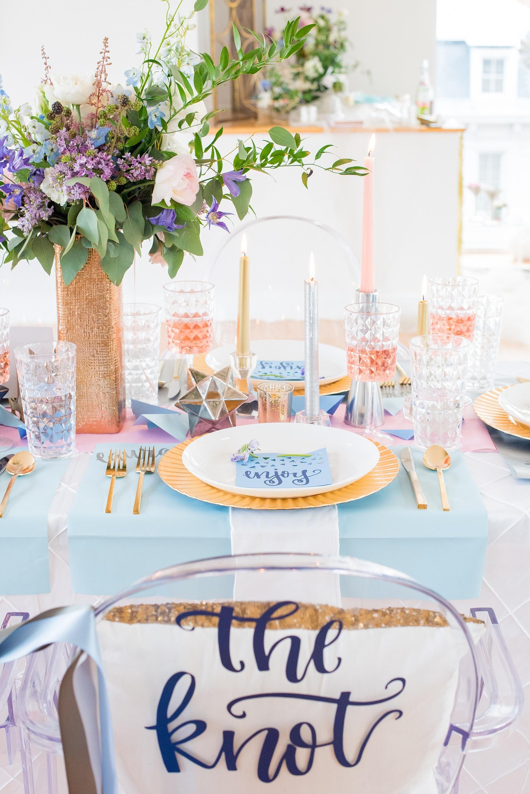 The Glass Box at 230 wedding photos by Mikkel Paige Photography. Serenity blue and Rose Quartz pink inspiration in Raleigh with hand lettering glass signs by Bella Joviality. Styling by Glitter Inc., flowers by Eclectic Sage.