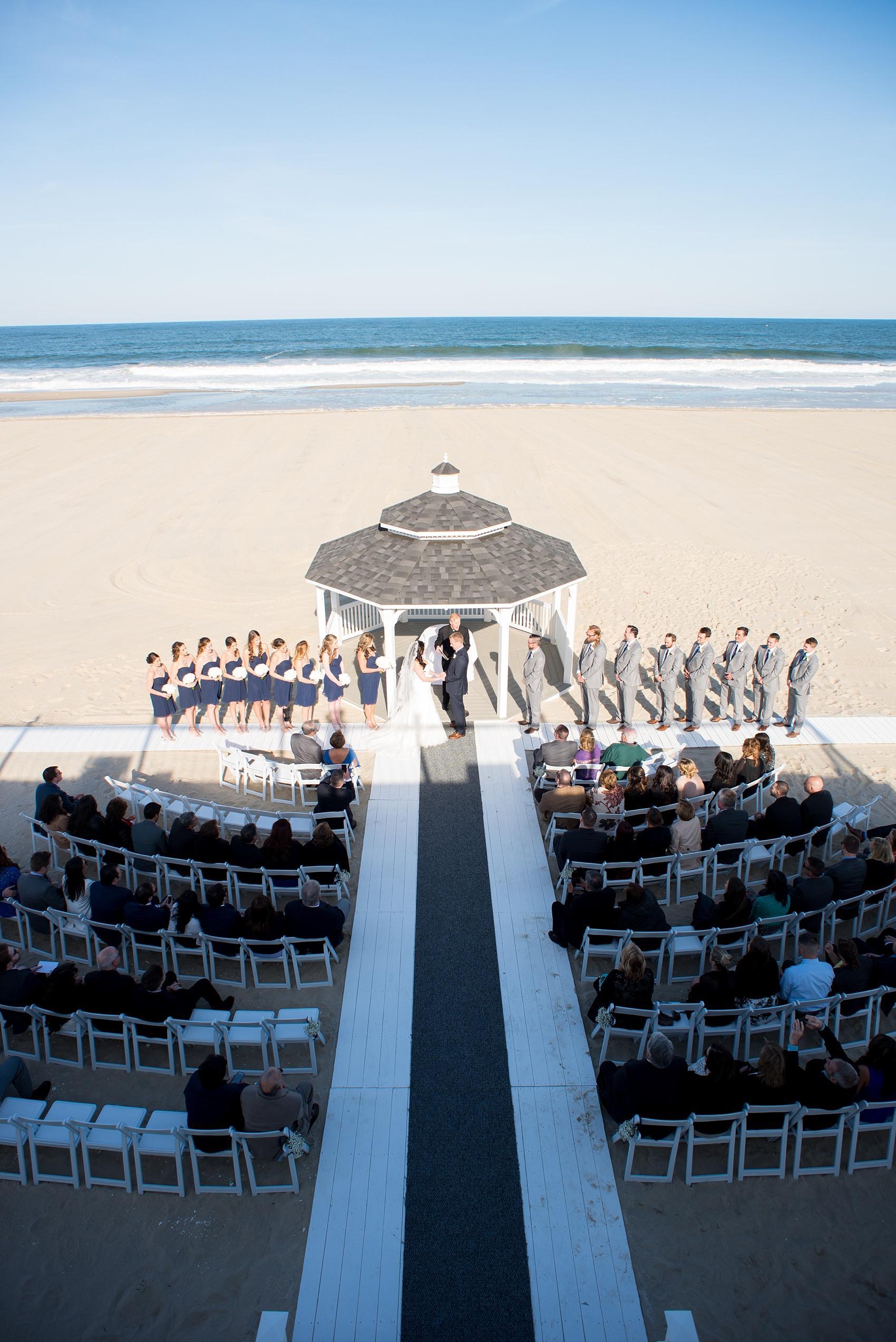 Photo by Mikkel Paige photography. Windows on the Water beach wedding ceremony during April spring nuptials.
