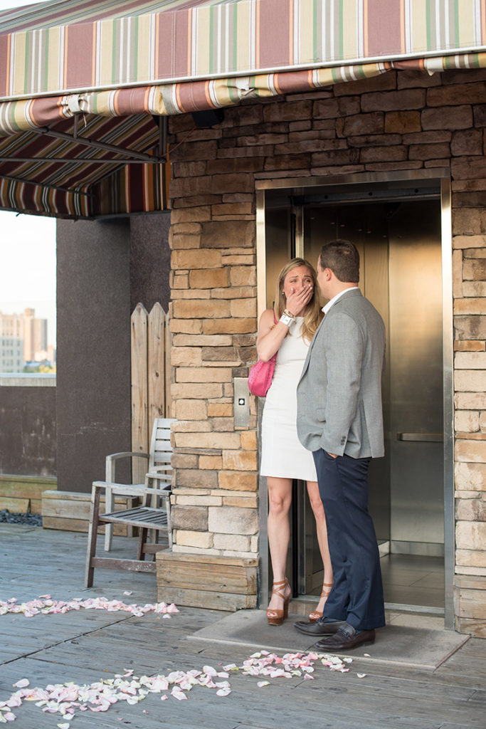 NYC rooftop proposal photos by Mikkel Paige Photography, New York wedding photographer.