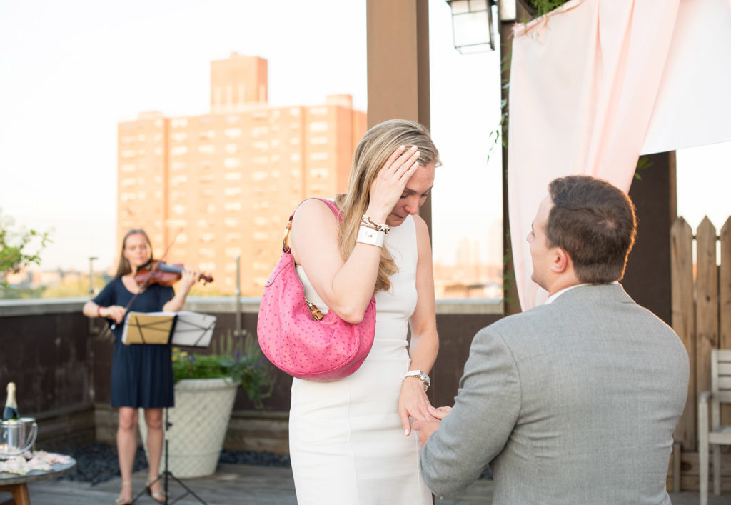 NYC rooftop proposal photos by Mikkel Paige Photography, New York wedding photographer.