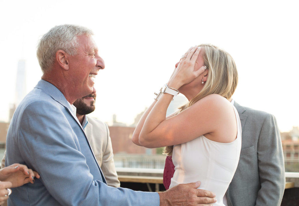 NYC rooftop proposal photos by Mikkel Paige Photography, New York wedding photographer.