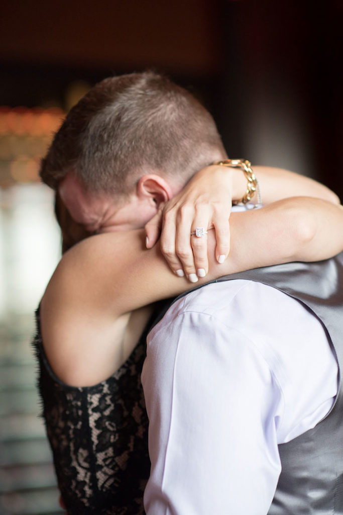NYC Proposal Photographer Mikkel Paige Photography captures a travel themed marriage proposal in Columbus Circle.