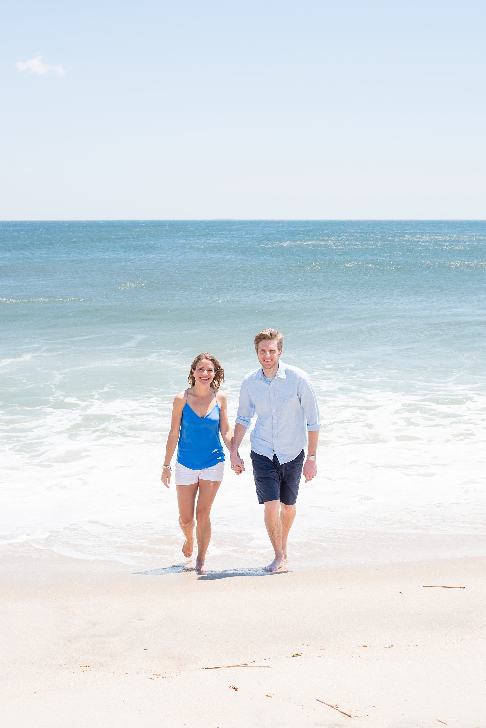 Mikkel Paige Photography captures a Bay Head, NJ engagement session on the beach with the bride in blue.