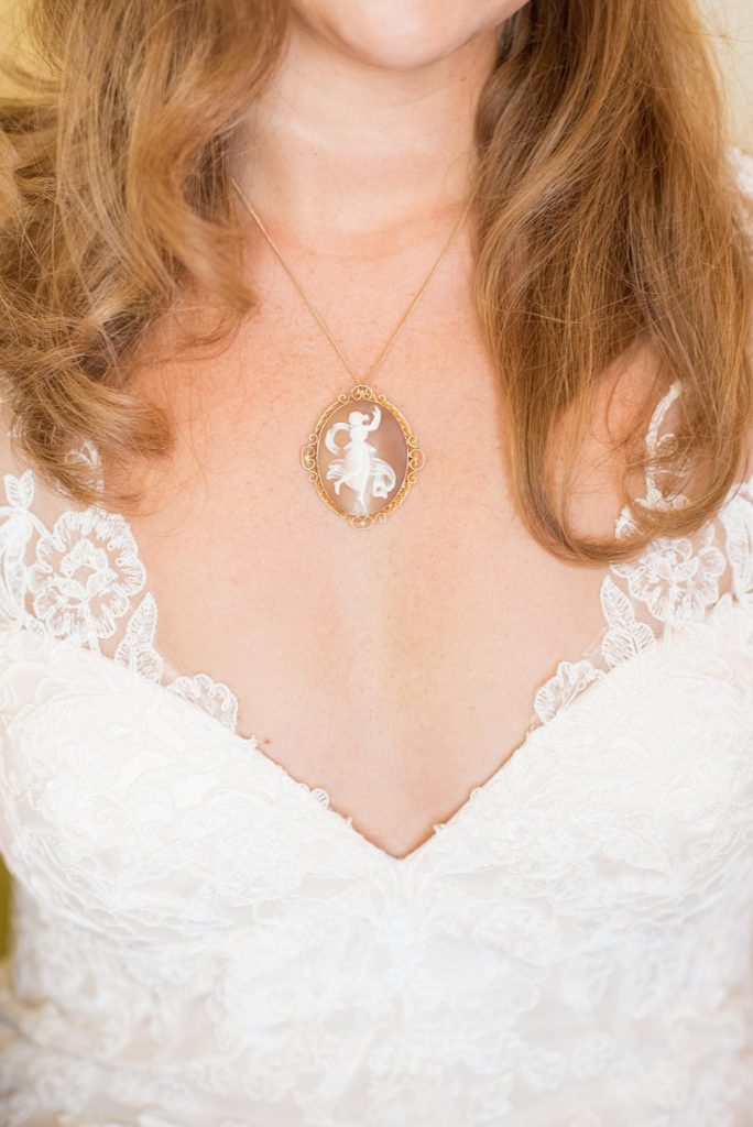 A detail picture of a cameo necklace at The Carolina Inn by Mikkel Paige Photography, in Chapel Hill, NC.