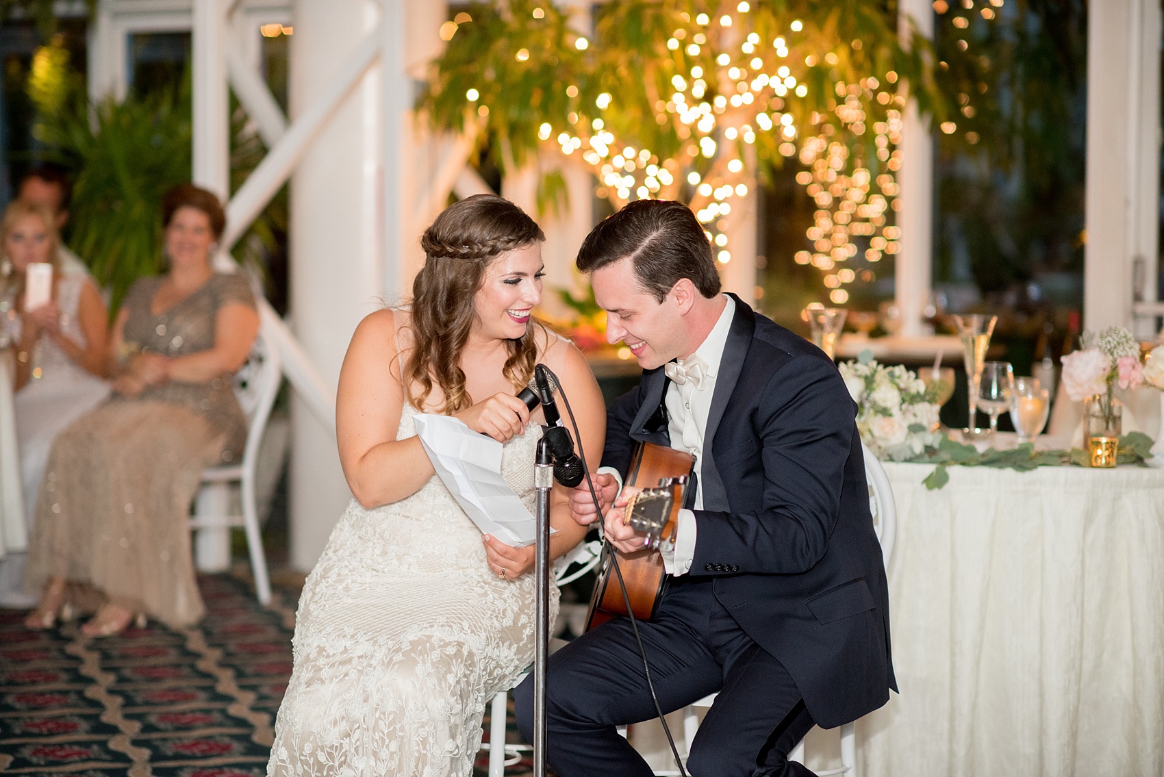 Mikkel Paige Photography photo of a wedding at Madison Hotel in NJ. Reception in The Conservatory with the bride and groom singing a duet.