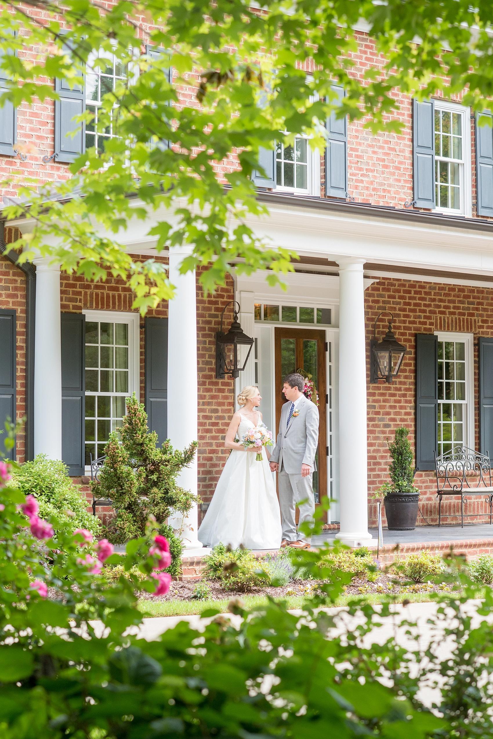 Mikkel Paige Photography pictures of a wedding in downtown Raleigh. Photo of the bride and groom in her family's garden and front porch.