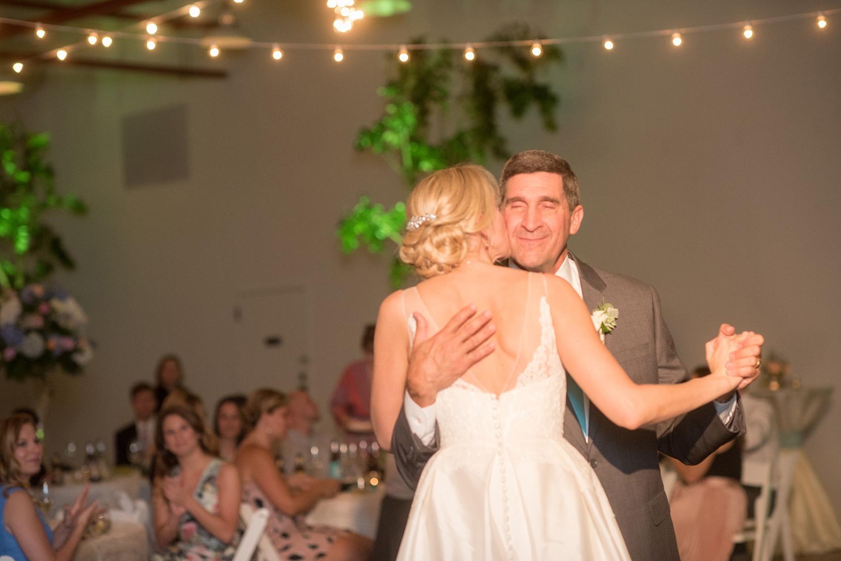 Mikkel Paige Photography pictures of a wedding in Raleigh. Photo of the bride's emotional dance with her father.