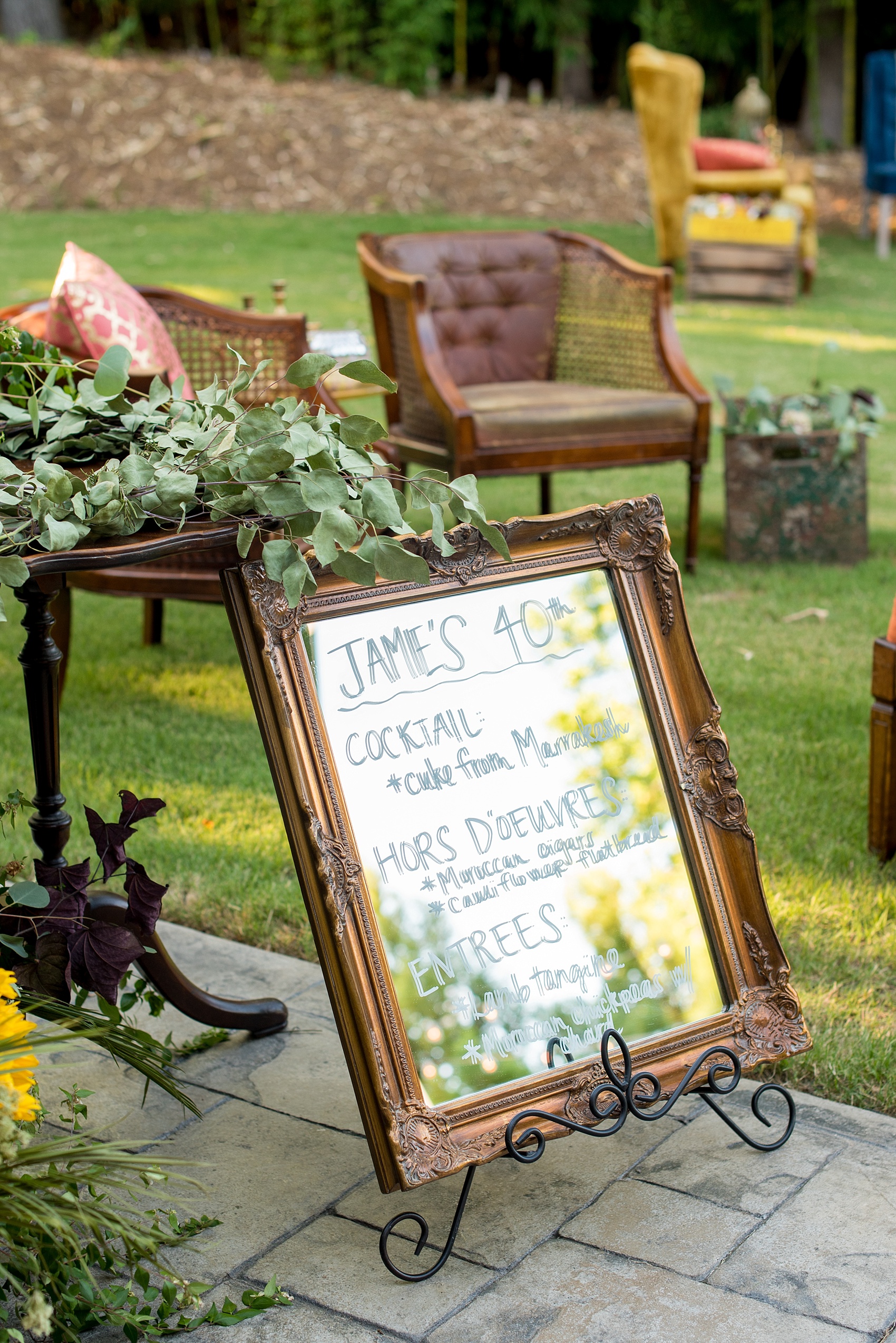 Mikkel Paige Photography photo of Moroccan themed party with cocktail list on a framed mirror.