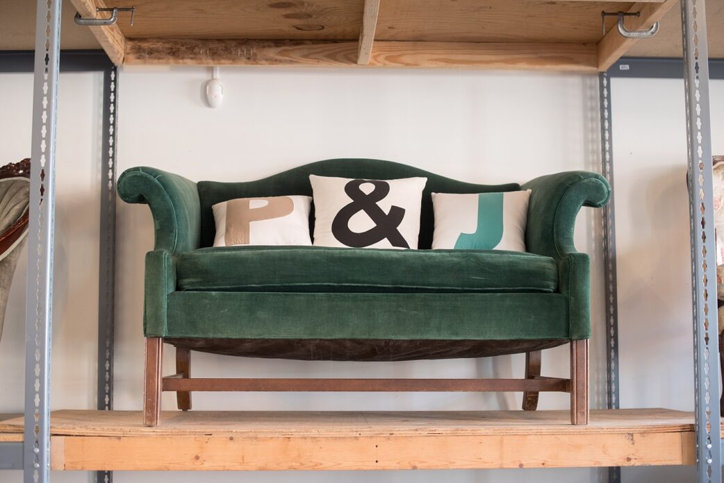 Mikkel Paige Photography photos of vintage furniture renal company Paisley and Jade in Richmond, Virginia. Velvet green couch.