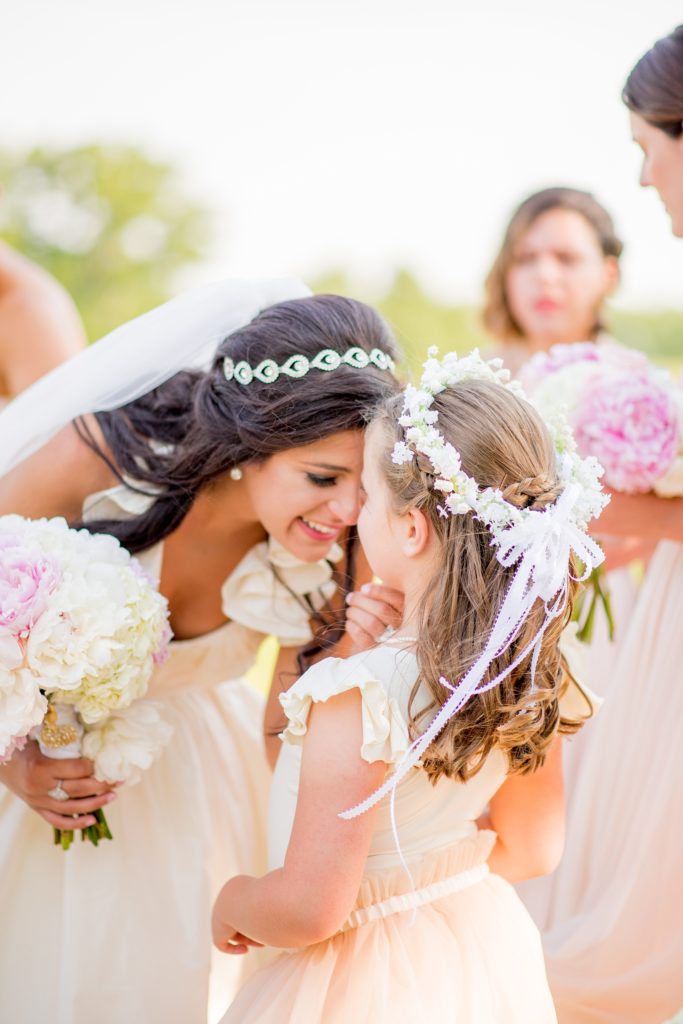 Basking Ridge Country Club wedding on a golf course property in New Jersey with the bride and and her flower girl.