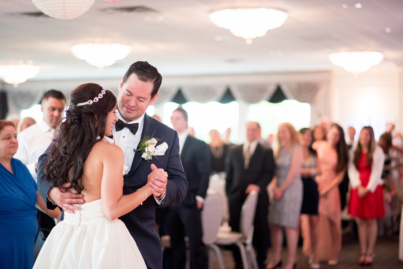 Mikkel Paige Photography photos from a wedding at Basking Ridge Country Club, NJ. A reception with blue, pink and white details. The bride and groom share a first dance.