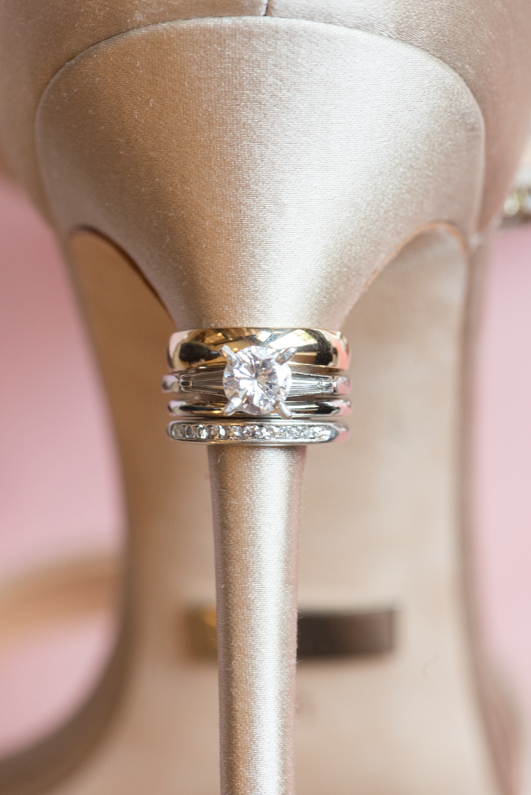 Mikkel Paige Photography unique detail photo of wedding bands and engagement ring at Temple Emanu-El in Closter, New Jersey.