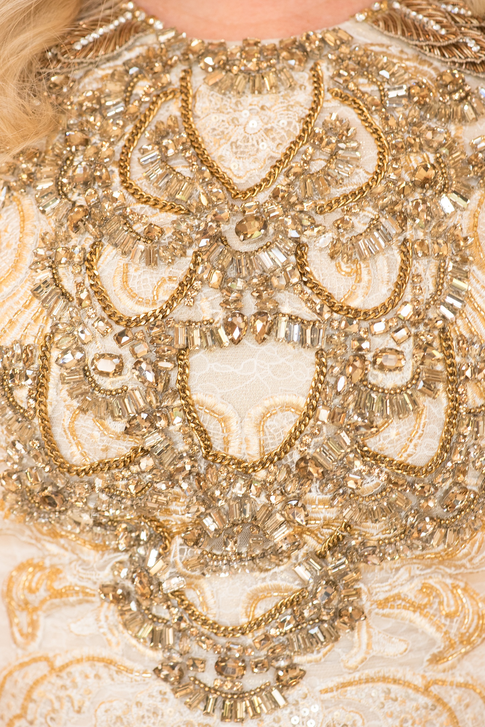 Mikkel Paige Photography photo of the bride's mother's metallic gold and copper dress detail at Temple Emanu-El in Closter, NJ. 