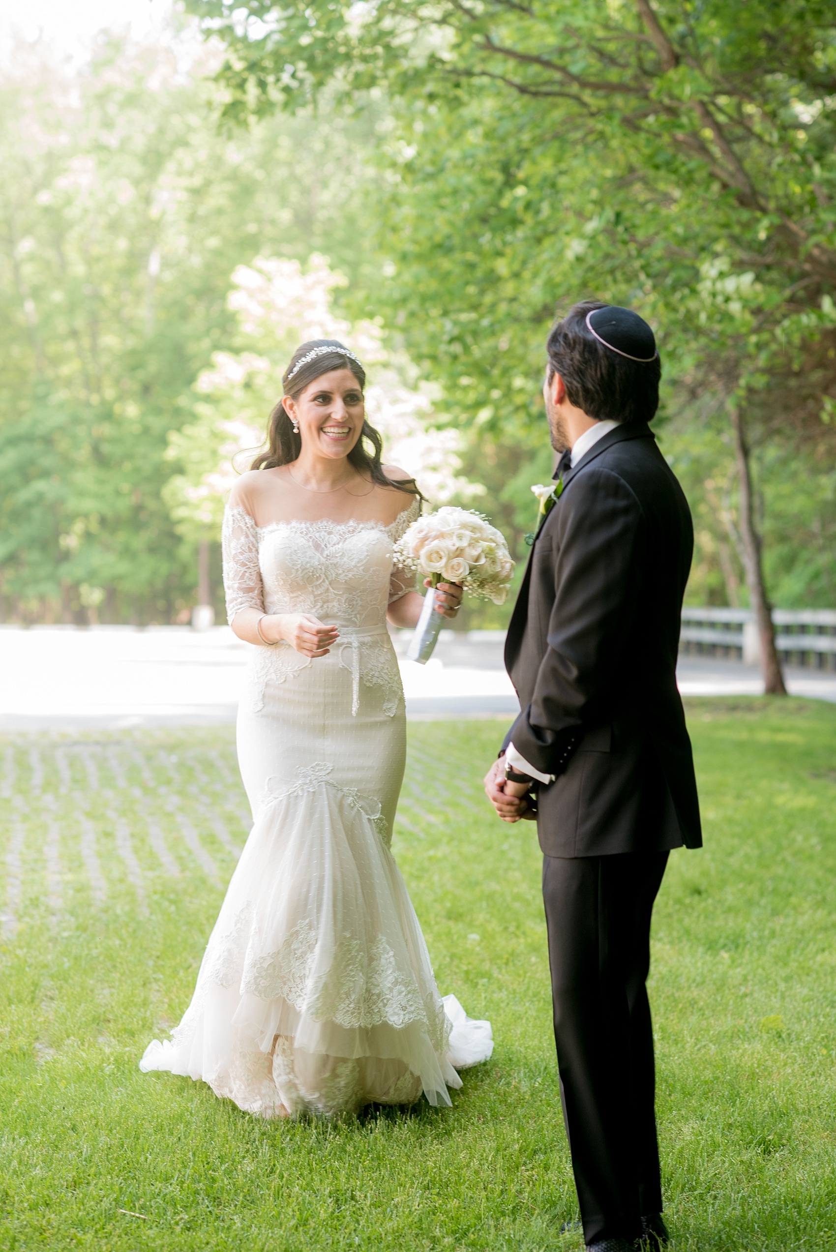 Mikkel Paige Photography photo of the bride and groom's first look on their wedding day at Temple Emanu-El in Closter, NJ. 