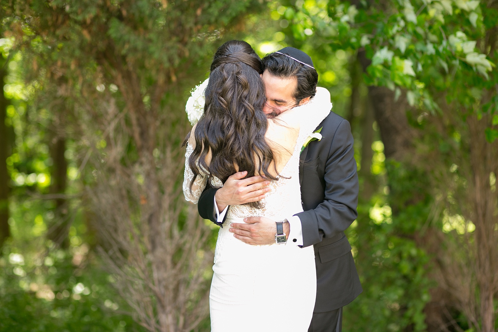 Mikkel Paige Photography photo of the bride and groom's first look on their wedding day at Temple Emanu-El in Closter, NJ. 