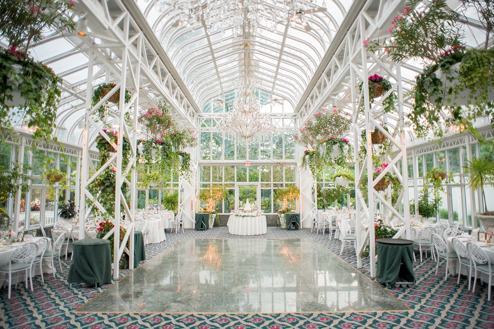 Mikkel Paige Photography photo of a wedding at the Madison Hotel in NJ. Photo of the reception in The Conservatory.