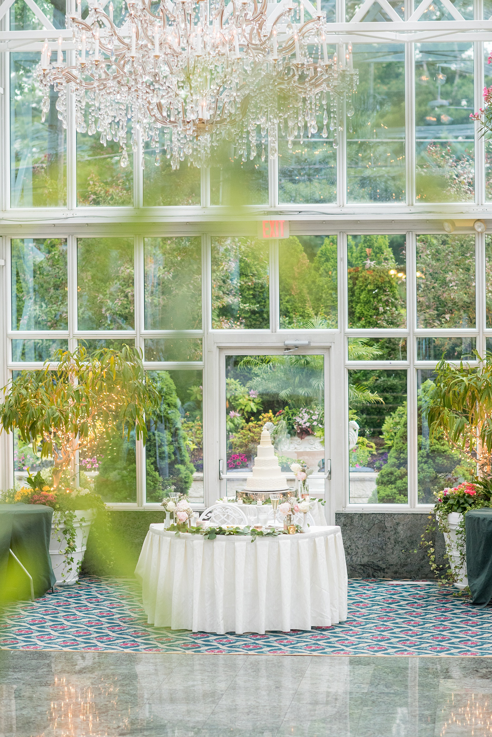 Mikkel Paige Photography photo of a wedding at Madison Hotel in NJ. Photo of the Congress Capital Dome cake in The Conservatory.