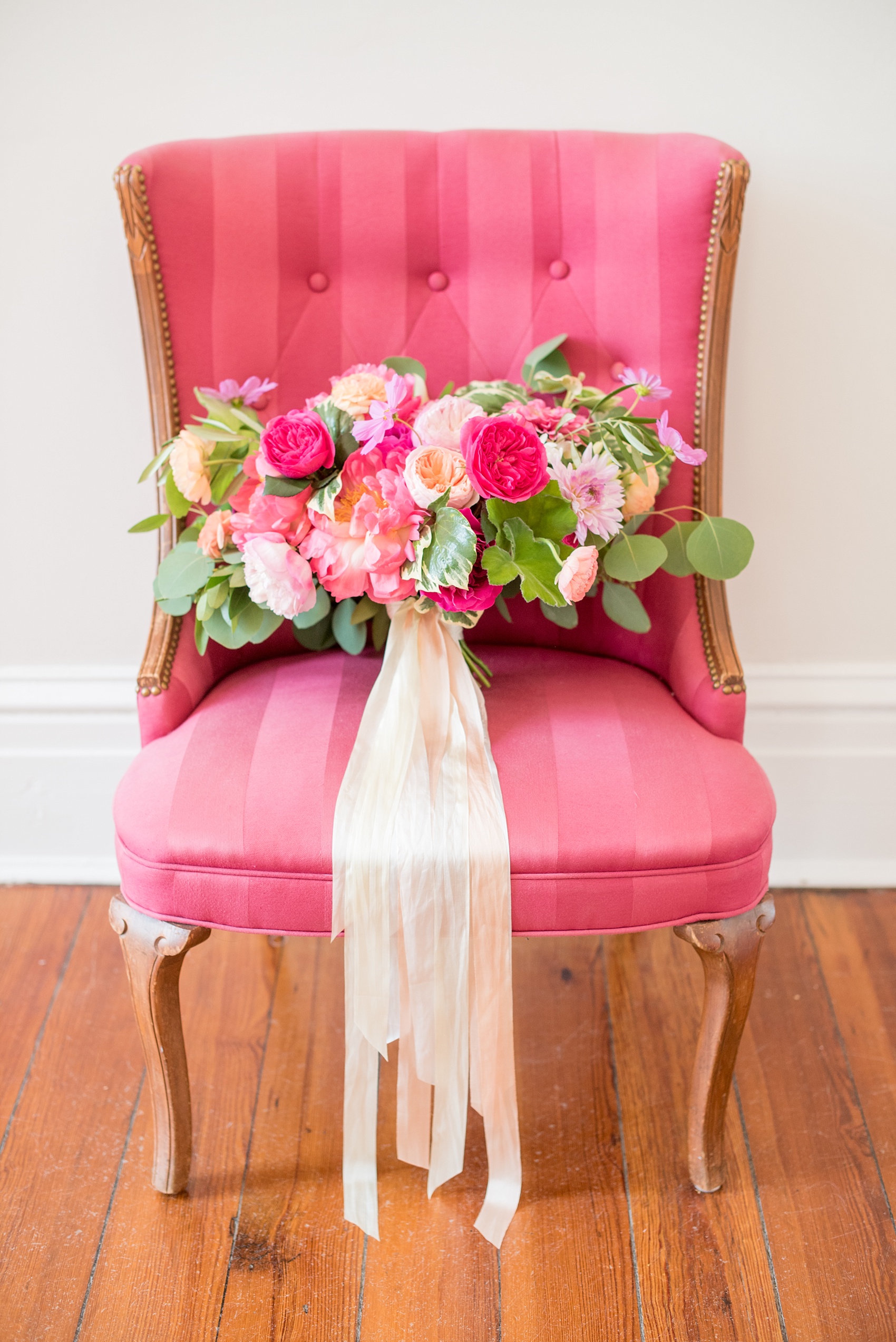 Mikkel Paige Photography wedding photos at The Merrimon-Wynne House in downtown Raleigh. Vibrant bouquet with roses and peonies by Meristem Floral.